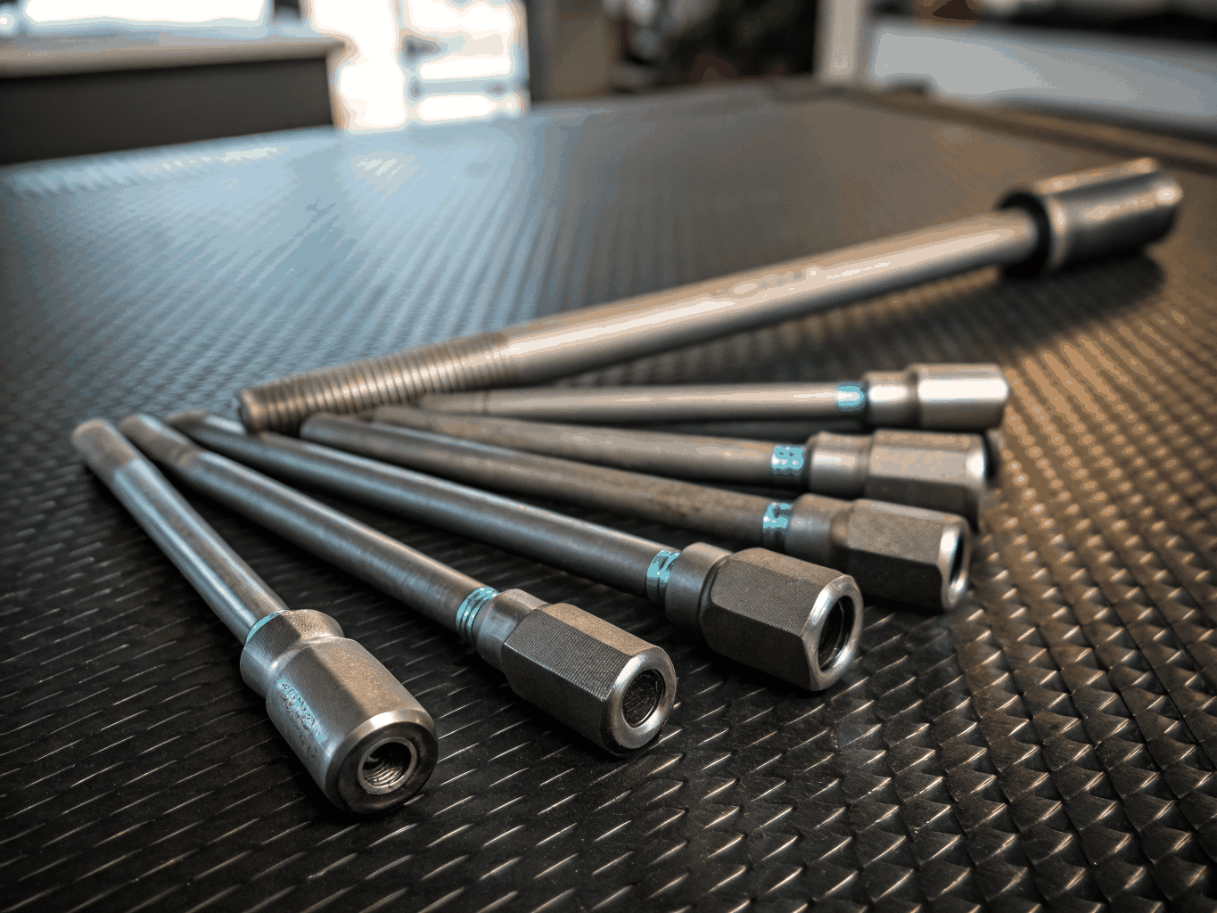 Pneumatic air impact wrench and high pressure hose fitting